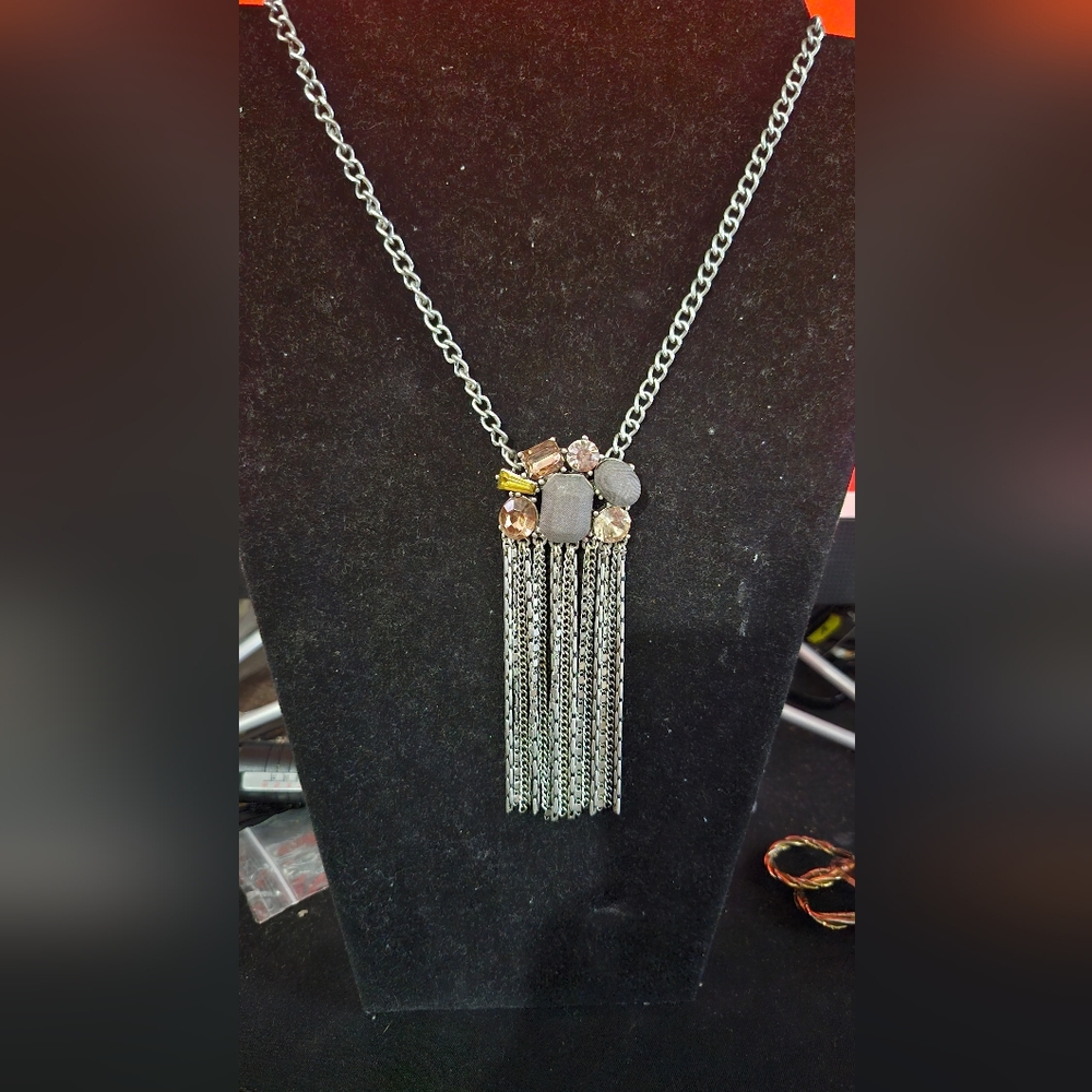 Jessica Simpson Silver Tone necklace with colored gemstones and gray fabric